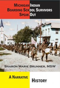 Cover of a book titled "michigan indian boarding school survivors speak out" by sharon marie brunner, msw, featuring a historical photo of a group of native american children and adults marching in uniforms with american flags and a drum corps, suggesting the context of indian boarding schools in michigan.