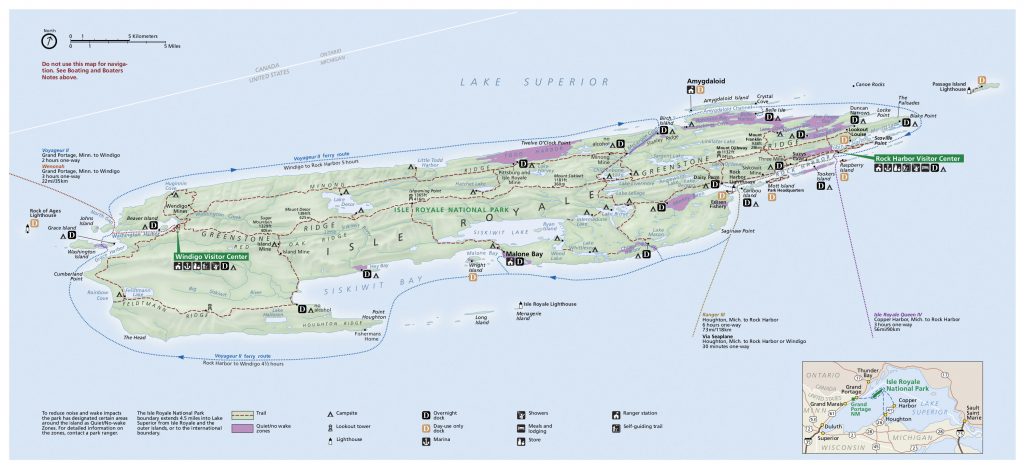 Map of Isle Royale National Park showing hiking trails, campgrounds, landmarks, visitor centers, and ferry routes, with Lake Superior surrounding the island. Inset map shows the island’s location relative to Ontario and Michigan.