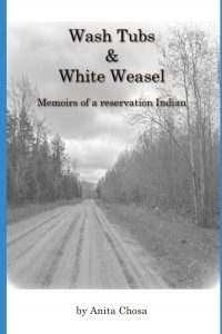 Book cover for "Wash Tubs & White Weasel: Memoirs of a reservation Indian" by Anita Chosa, featuring a black and white photo of a rural dirt road surrounded by trees under a cloudy sky.