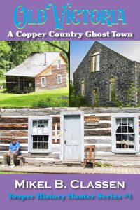 Book cover for "Old Victoria: A Copper Country Ghost Town" by Mikel B. Classen shows three historic buildings and a man sitting on a porch. The cover uses purple and yellow text and highlights it as part of a history series.